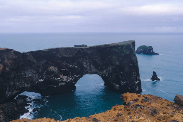 istock Dyrholaey, Arch with Hole, Iceland 1330302216
