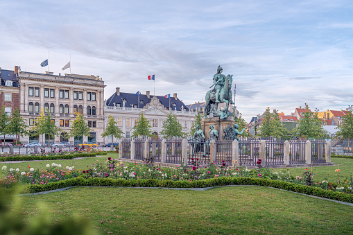 Kongens Nytorv Square with Christian V Statue and Thott Mansion (French Embassy) on background - Copenhagen, Denmark