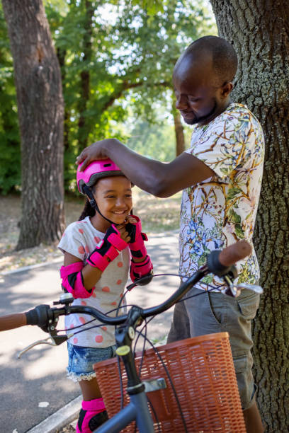 istock Cute Black Girl Learning To Skate 1330326068