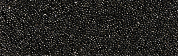 istock Black stones crystals close-up background 1330326567