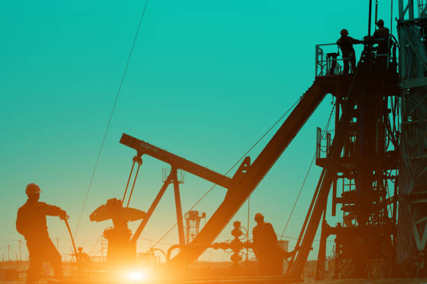 istock Oil drilling exploration, the oil workers are working 1330331455