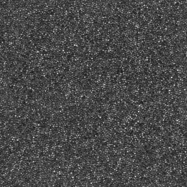 czarny wzór tekstury pianki - bezszwowa ilustracja wektorowa ciemnej gąbki w makro z widocznymi szczegółami małych pęcherzyków powietrza - oryginalna porowata gładka, jednolita powierzchnia - abstrakcyjne tło - rubber foam stock illustrations