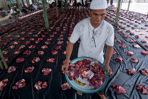 The Islamic holiday committee (PHBI) slaughters and distributes sacrificial animals at the Baitul Ala Lilmujahiddin Mosque complex, Beureunuen City, Pidie Regency, Aceh on July 20, 2021. The slaughter of sacrificial animals is a momentum in welcoming the Eid al-Adha holiday 1442 H/2021 AD to increase piety and sharing spirit.

Although Indonesia has been designated as an area with stricter Enforcement of Community Activity Restrictions (PPKM), this year's slaughter of sacrificial animals in Aceh will continue as usual. Residents continue to attend the slaughter site, although they are advised to stay at home. Changes in the rules of health protocols are still strictly enforced, but for the people to admit that Aceh does not limit matters of worship, either the slaughter of sacrificial animals to the implementation of Eid al-Adha prayers in the midst of a pandemic that is still raging