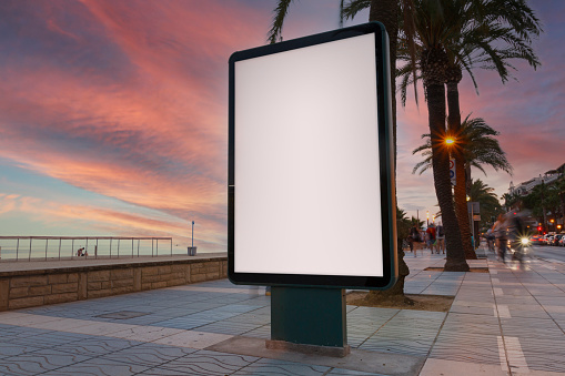 The bus stop shelters and advertising light boxes