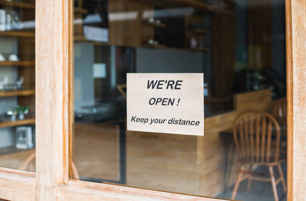 istock We are open keep distance during covid situation. 1330338257
