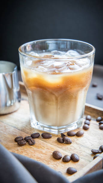 istock Iced coffee closeup with milk and pitcher. 1330338939