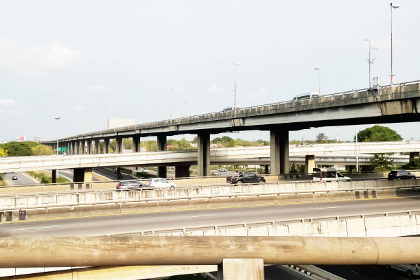 istock Image junction and intersection of elevated expressway on suburb area to support transportation industry presentation and report background. 1330341877