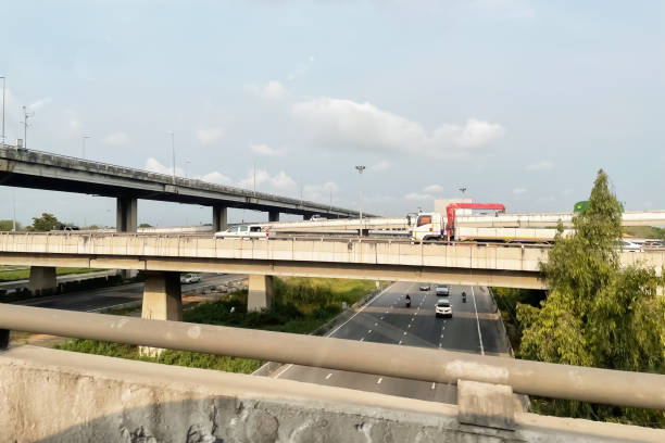 istock Image junction and intersection of elevated expressway on suburb area to support transportation industry presentation and report background. 1330342385