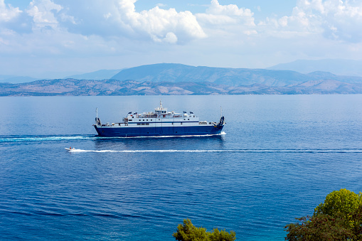 A picturesque view of boats in the sea of Corfu from the fortress of the Corfu town in Greece.