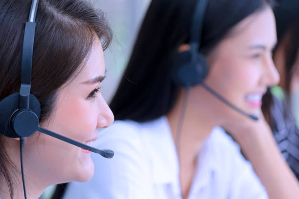 istock employee working at service center. 1330354800
