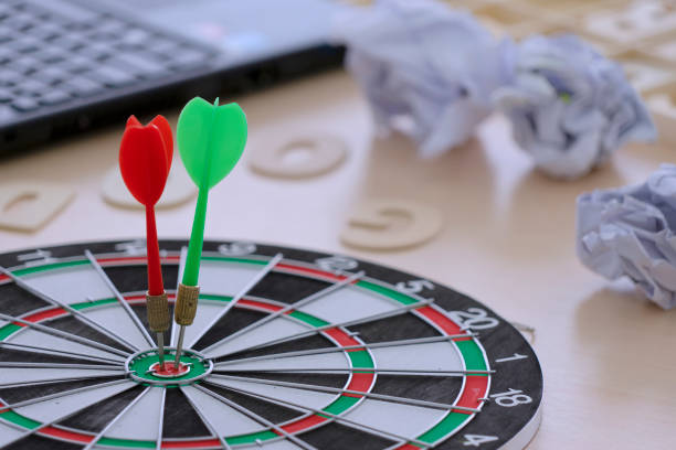 istock dart hit center of target. 1330355841