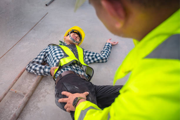 istock First Aid for Emergency Accidents at Construction Sites. Construction worker was injured in a fall from a height at a construction site. 1330359318