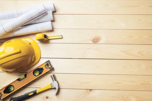 istock Work safety. Standard Construction site protective equipment on  top view wooden background, flat lay, copy space,safety first concepts. 1330368522