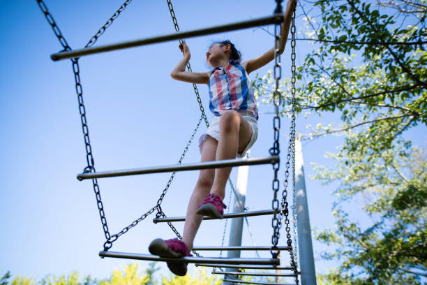 istock Girl playing with playset in the park 1330369301