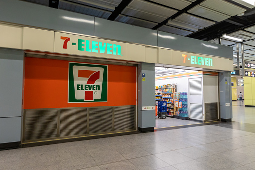 Hong Kong - July 24, 2021 : 7-Eleven Convenience Store in the MTR Nam Cheong Station in Sham Shui Po, Kowloon, Hong Kong. 7-Eleven is an international chain of convenience stores.