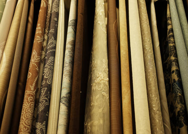 istock Rolls of fabric and textiles in store 1330373210
