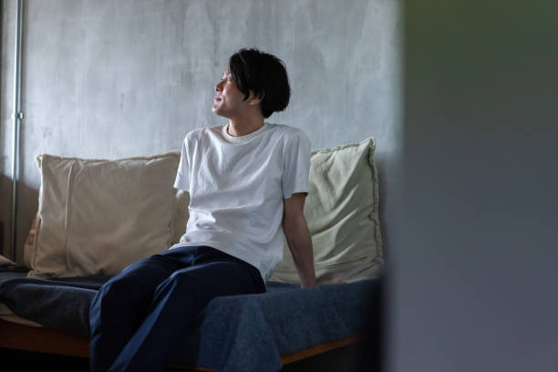 Young man living alone at home
