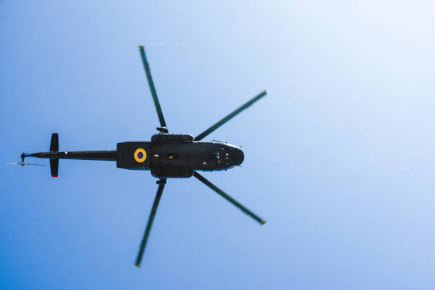 istock military helicopter flying seen from below 1330376067