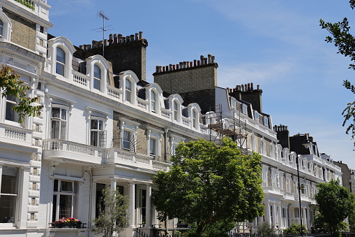 Row of typical English terraced house in south kensington, London, UK