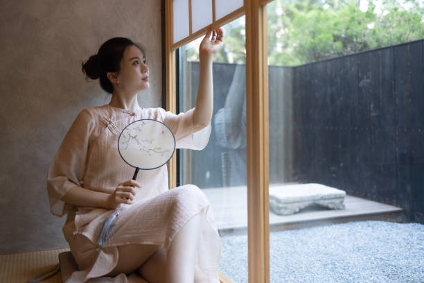 Asian women by the window