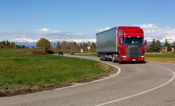 istock Red Truck On the Road 1330384995