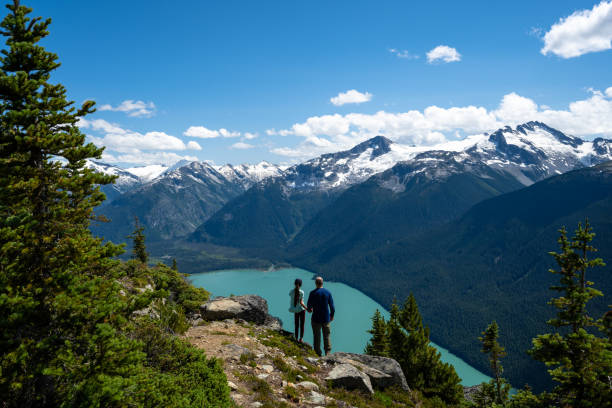 istock Father and daughter hiking on a summer vacation 1330387300