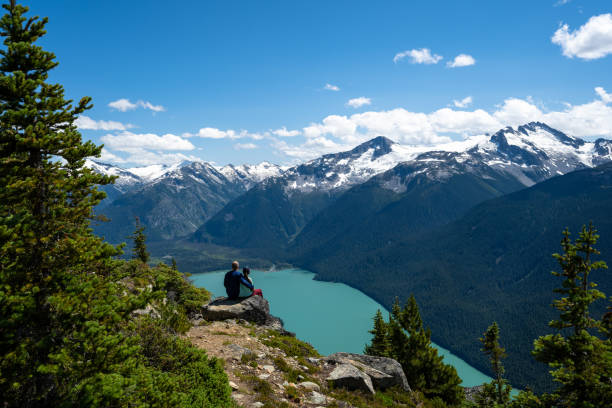 istock Father and daughter hiking on a summer vacation 1330387369