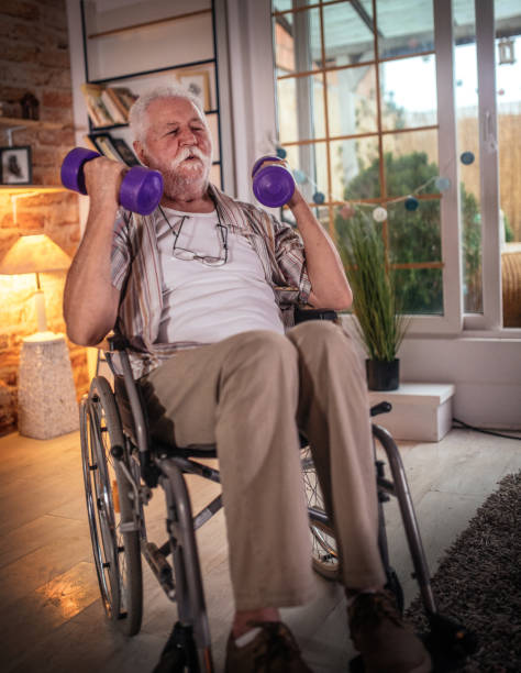istock Disabled Man Lifting Dumbbells at home 1330388031