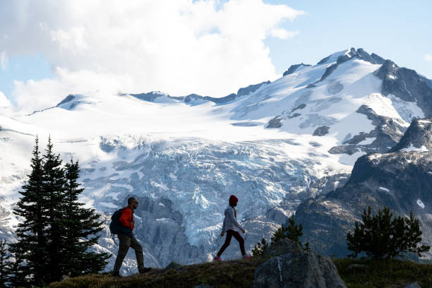 istock Father and daughter hiking on a summer vacation 1330388130