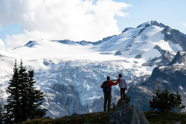 istock Father and daughter hiking on a summer vacation 1330388162