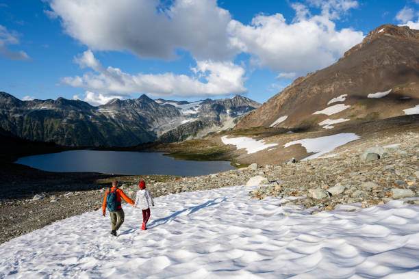 istock Father and daughter hiking on a summer vacation 1330388227