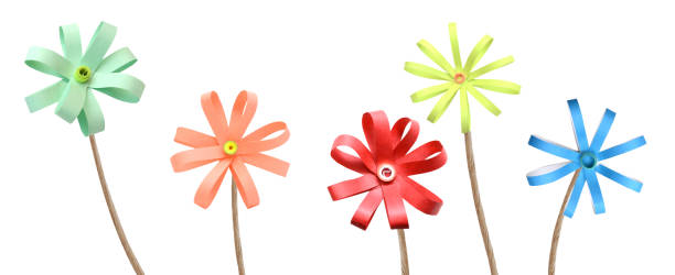 istock Multi color origami flowers on white background 1330390318