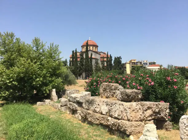 Photo of The Church of Holy Trinity at Kerameikos, also known as Ceramicus, in Athens, Greece. It was the potters' quarter of the city and was also the site of an important cemetery and numerous funerary sculptures erected along the Sacred Way.