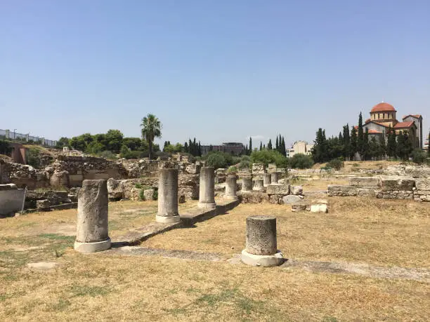 Photo of The ruins of the Pompeion at Kerameikos, also known as Ceramicus, in Athens, Greece. It was the potters' quarter of the city and was also the site of an important cemetery and numerous funerary sculptures erected along the Sacred Way.