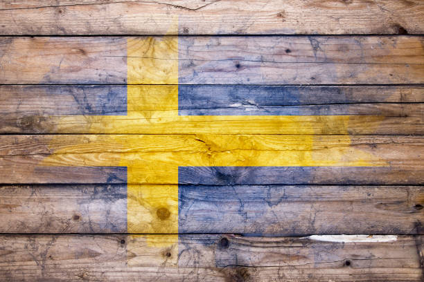 istock Swedish flag on wooden boards 1330395544