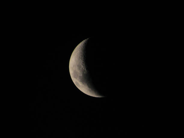 istock Crescent moon or concave crescent floating in the black southern hemisphere sky. 1330396537