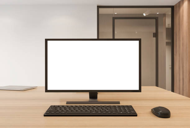 istock Blank computer monitor on office desk 1330399841