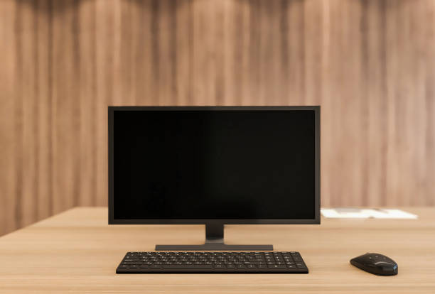 istock Blank computer monitor on office desk 1330399842