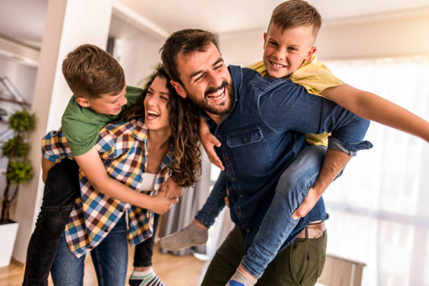 istock Playful family having fun at home. 1330402451
