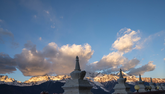 Meili snow mountain and Tibetan stupa at Feilai temple, Deqing, Yunnan, China