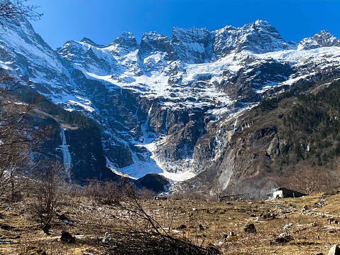 Tibetan prayer flags at a rest stop along the hiking trails to Yubeng village