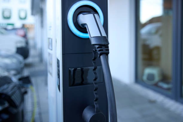 Plug-in electric vehicle charging station stock photo