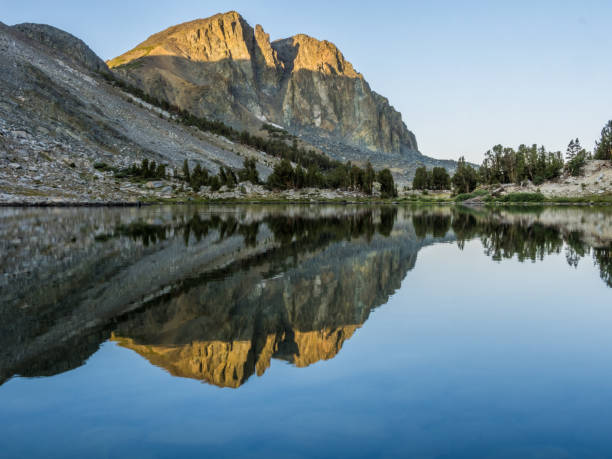 istock Early summer morning on mountain lake 1330410408