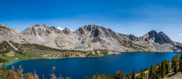istock Panoramic shot of mountain lake 1330410421