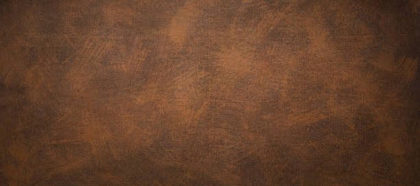 istock Abstract painted canvas or wall background texture. Artistic brown surface of wall 1330410426