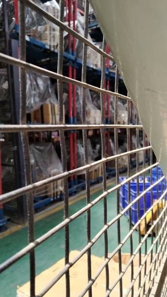 istock the iron window grill with blur background 1330410514