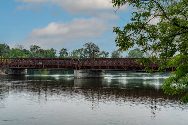 istock Railway Bridge on Otonabee River, Trans Canada Trail, Peterborough, Canada 1330412788