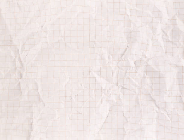 istock Crumpled white sectional paper sheet textured with empty space. 1330416762