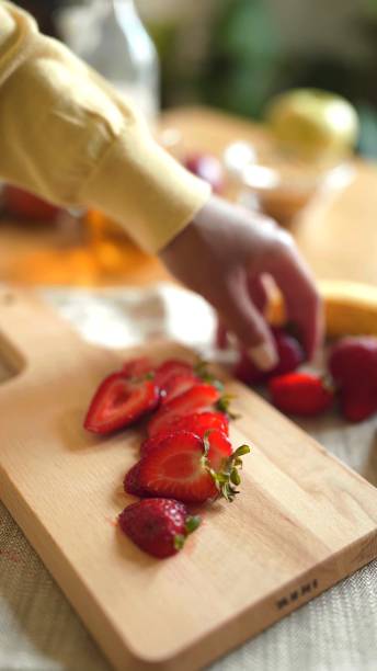 istock A woman is cooking with strawberries 1330421153