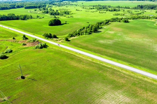 istock Highway through fields and arable land. View from above. Summer rural landscape 1330422733